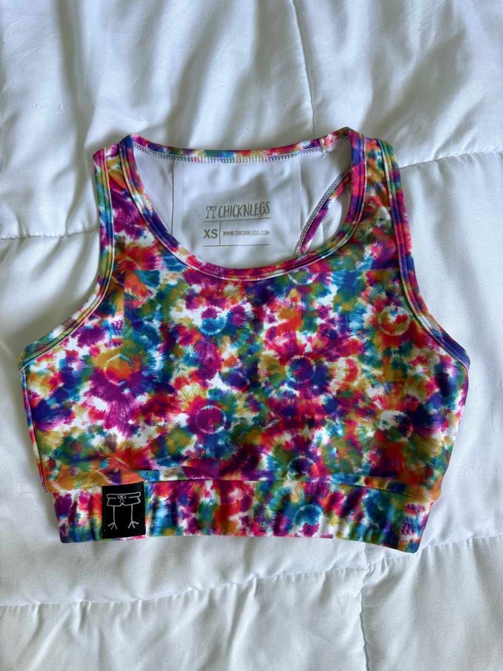 ChicknLegs Tie-Dye Crop Sports Bra - Multicolor. Phone pocket